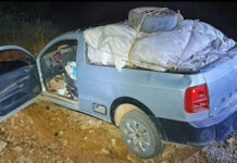 Carro roubado é encontrado com munição e rádios em Divinolândia