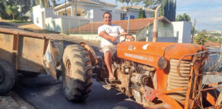 Ganhando o pão dirigindo um trator Massey Ferguson/66